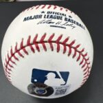 ARNOLD SCHWARZENEGGER Signed Baseball – A Foley’s BAR NYC original piece BAS Main Image